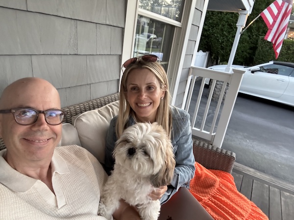 Nicole and Albert hang out in the front porch
